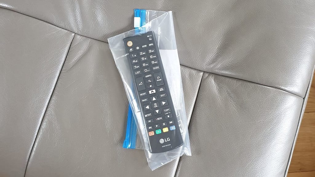 TV remote control in a plastic back on post-lockdown holiday in the UK