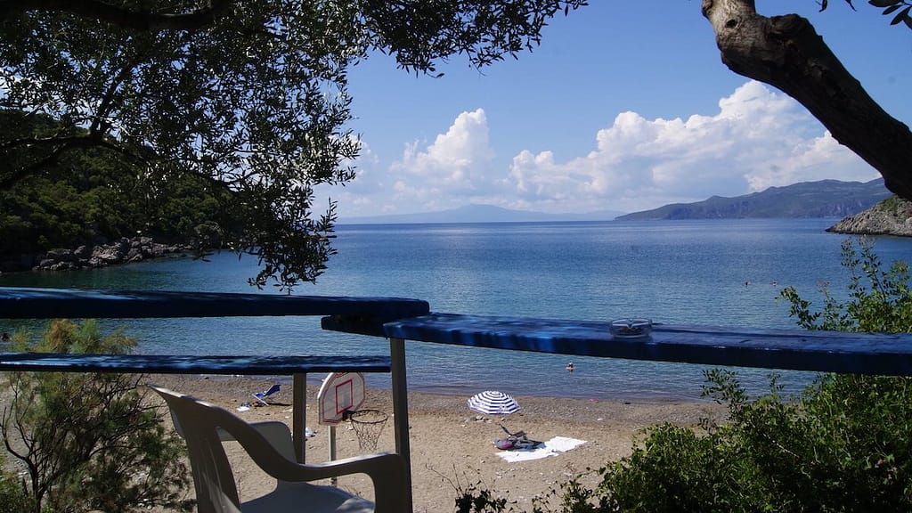 Looking down at Delfini beach from the taverna