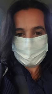 Kat wearing a facemask, post-lockdown